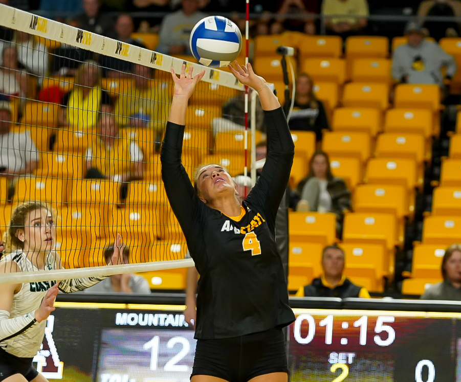 Setter Addison Heidemann reaches to set the ball against Coastal Carolina on Oct. 24.