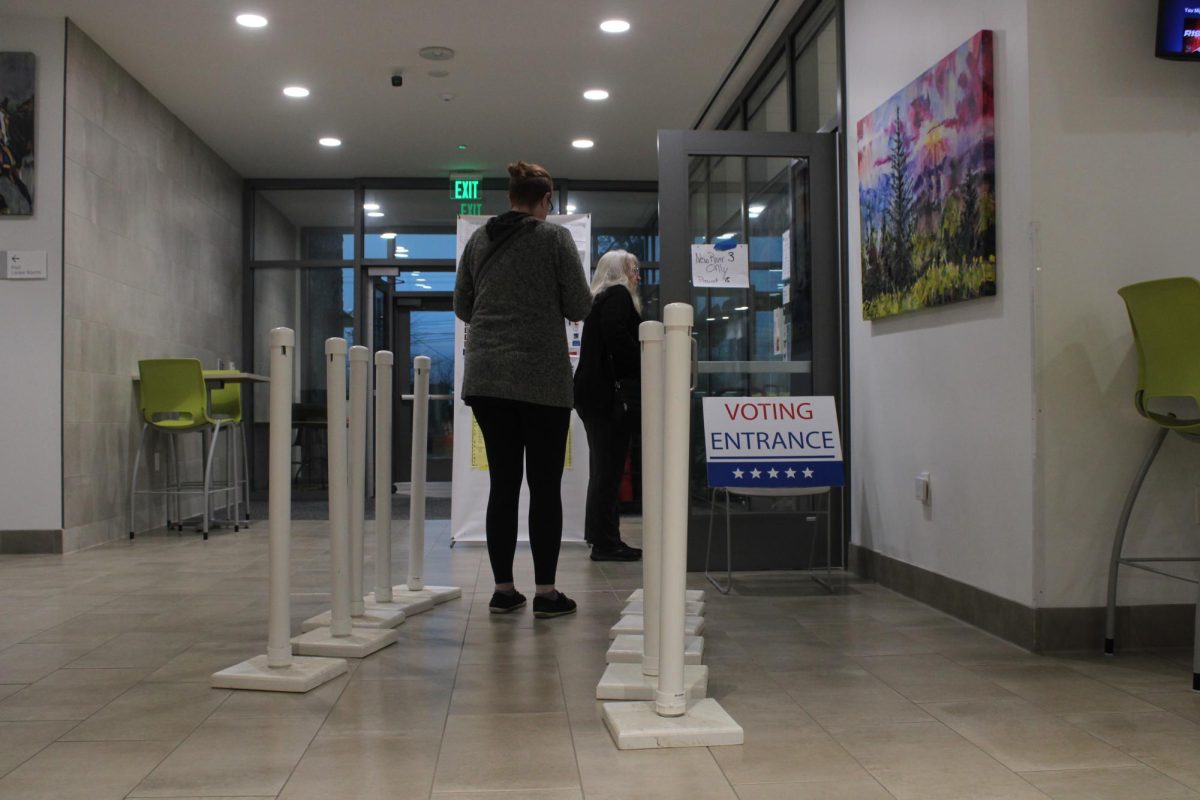 Voters stand in line to vote at the New River 3 precinct located at the Watauga Community Recreation Center on Nov. 5.
