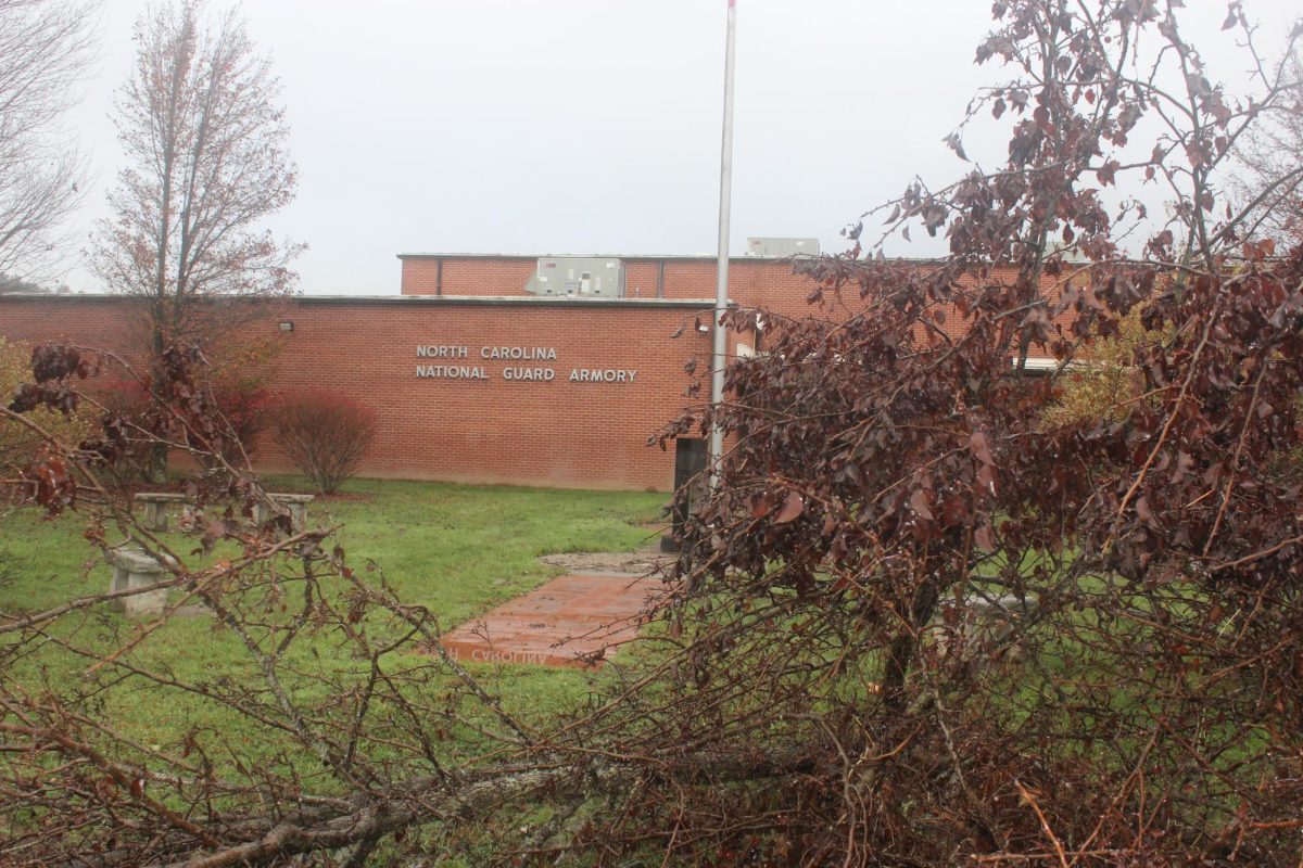 Debris piles up outside the National Guard Armory on Nov. 5 following damage from Hurricane Helene.