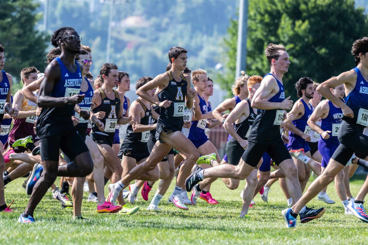 The App State men's cross country team races against other colleges at the Covered Bridge Open on Aug. 30.