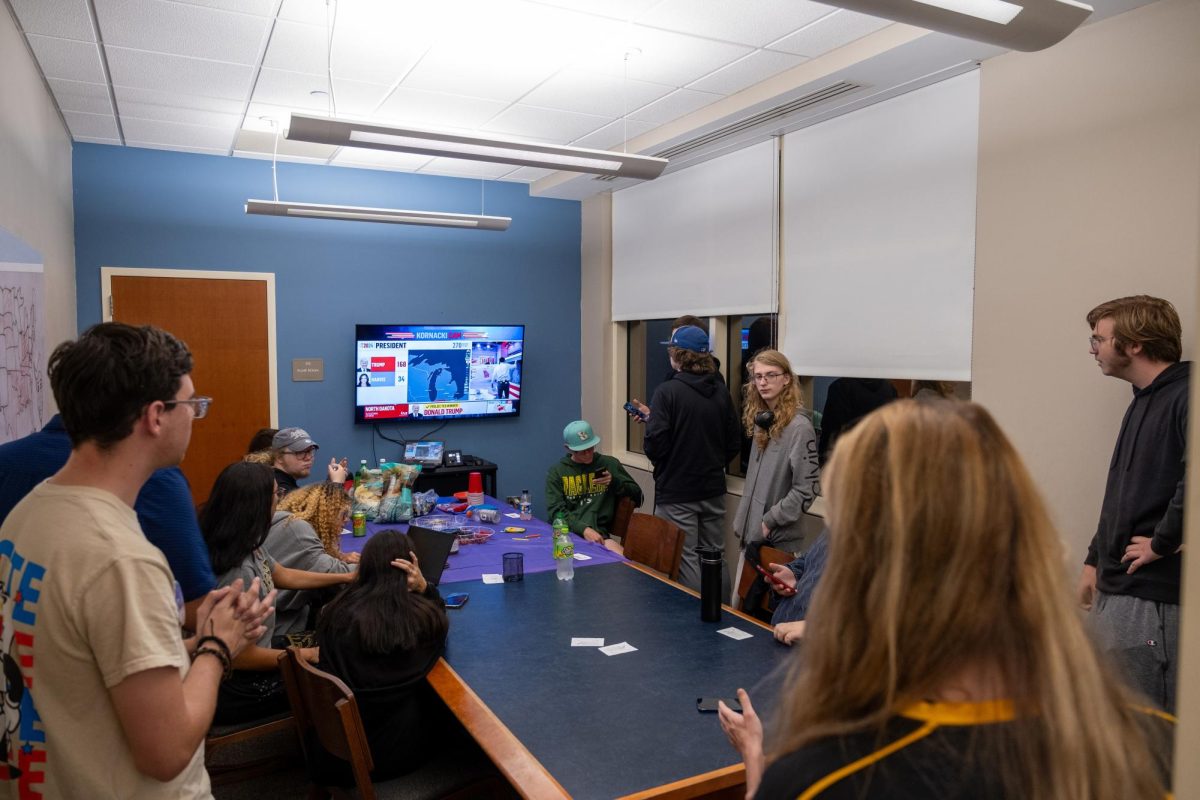 The App State Politics Club hosted an Election Night watch party open to all that started at 9 p.m. on Nov. 5. Club President Andrew Myers, pictured bottom left, and Ian Benitez, not pictured, were the only members from the club in attendance, with more than 20 other students and Boone citizens there as well.