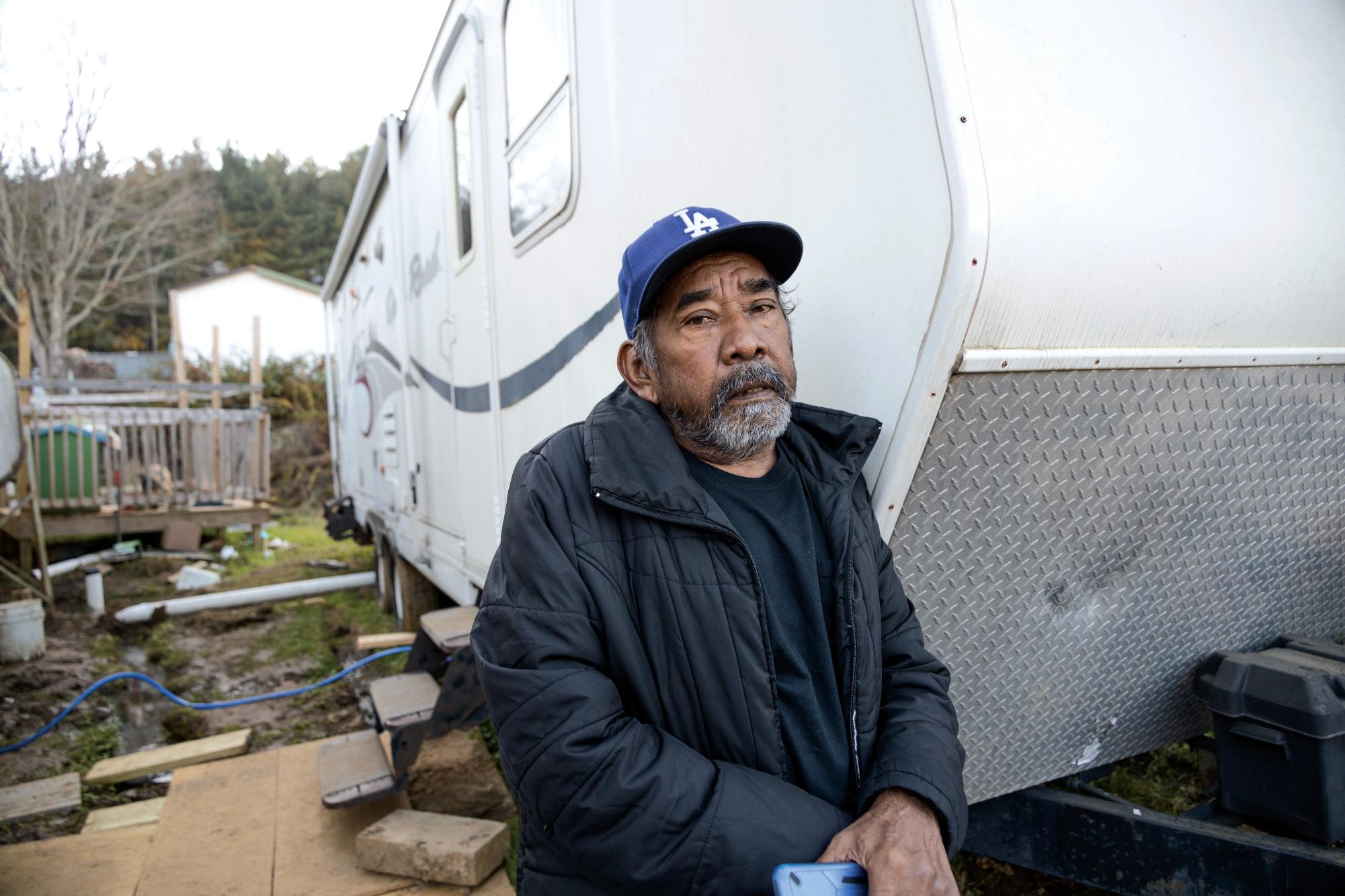 Martin Ramirez stood in front of a donated trailer on Oct. 29 that would serve as his temporary home. Harvest House Church volunteers helped Martin settle into the camper by providing propane and necessary supplies.