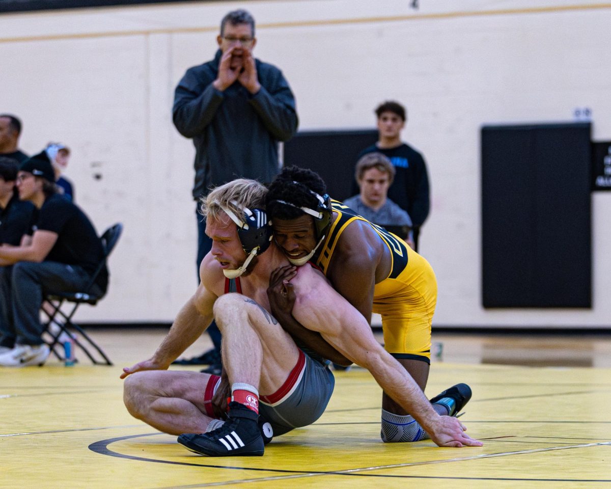 Redshirt senior 141-pound Sean Carter has a hold on his opponent at the Mountaineer Invitational on Nov. 9.