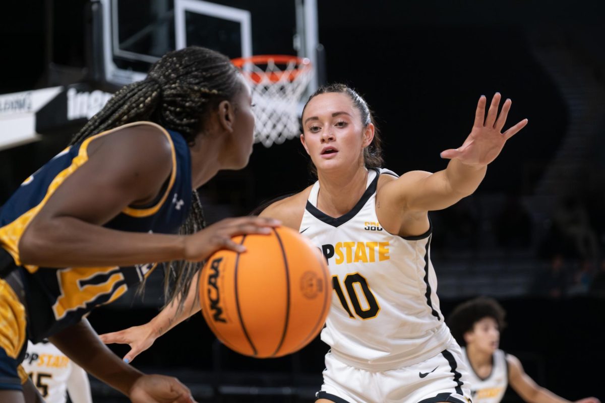 Junior guard Emily Carver defends UNC-Greensboro’s Nia Howard in the 4th quarter at Holmes Convocation Center on Nov. 6, 2023.