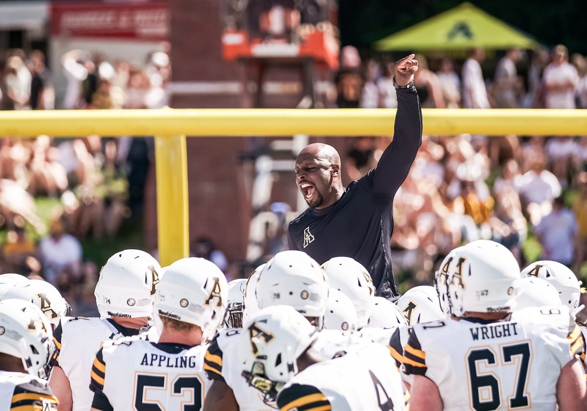 DJ Smith speaks to the App State football team at the App State vs. UNC-Charlotte game on Sept. 7, 2019. 