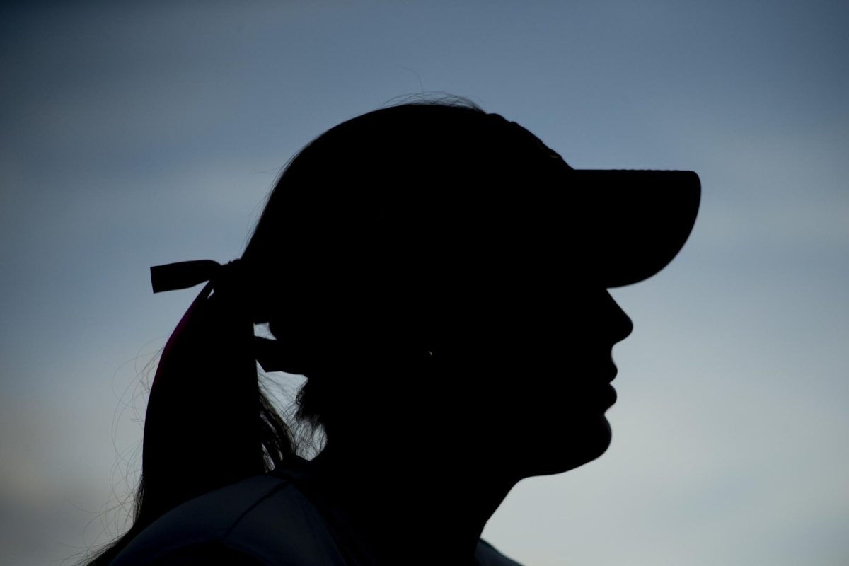 App State softball player’s silhouette during the App State vs. James Madison game on April 19.