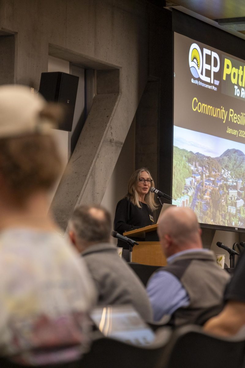 Quality Enhancement Plan Associate Director Laura England asks the audience to take a moment to share their heroes from Helene with one another at the Post-Helene Community Resilience Forum on Jan. 27. 