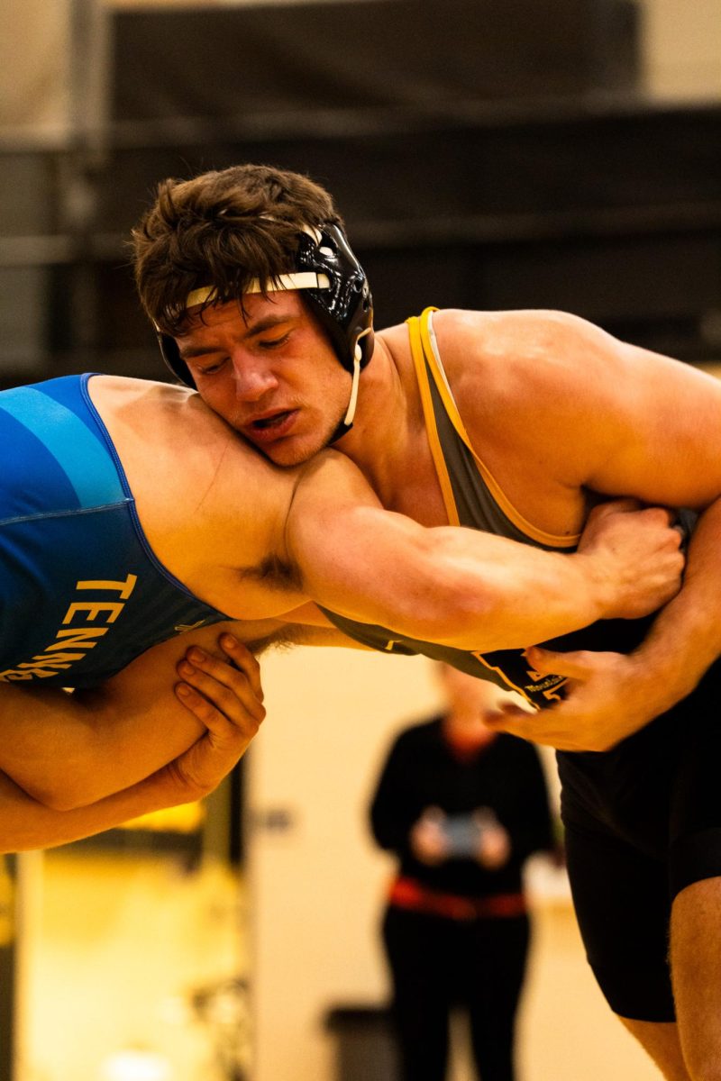 Redshirt freshman 174-pound Alex Hopper faces off against his opponent at the Mountaineer Invitational on Nov. 9.