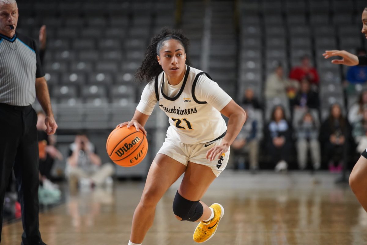 Senior guard Eleyana Tafisi looks to attack the Arkansas State defense during the App State vs. Arkansas State game on Dec. 29.
