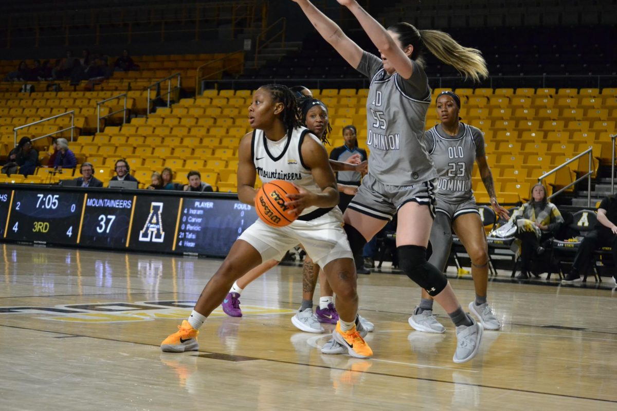 App State senior guard J'Mani Ingram drives the ball down court toward the basket against Old Dominion on Jan. 23.