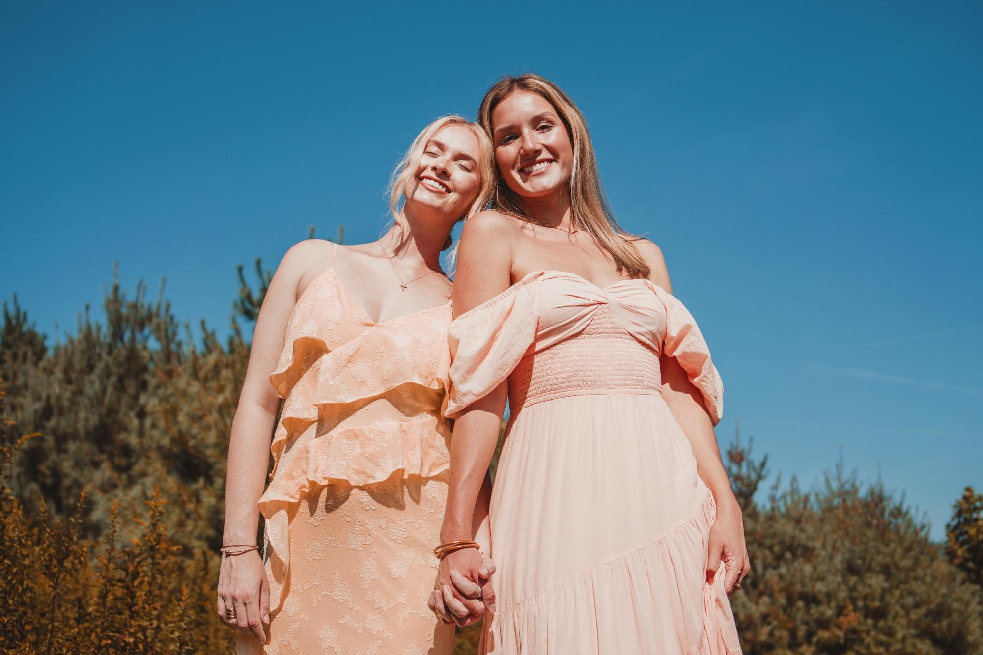 From left, Panhellenic Executive Council President Sage Hessert and Vice President of Recruitment Counselors Jenna Griffin embrace one another at an end of term photoshoot on Aug. 25. Courtesy of Sage Hessert