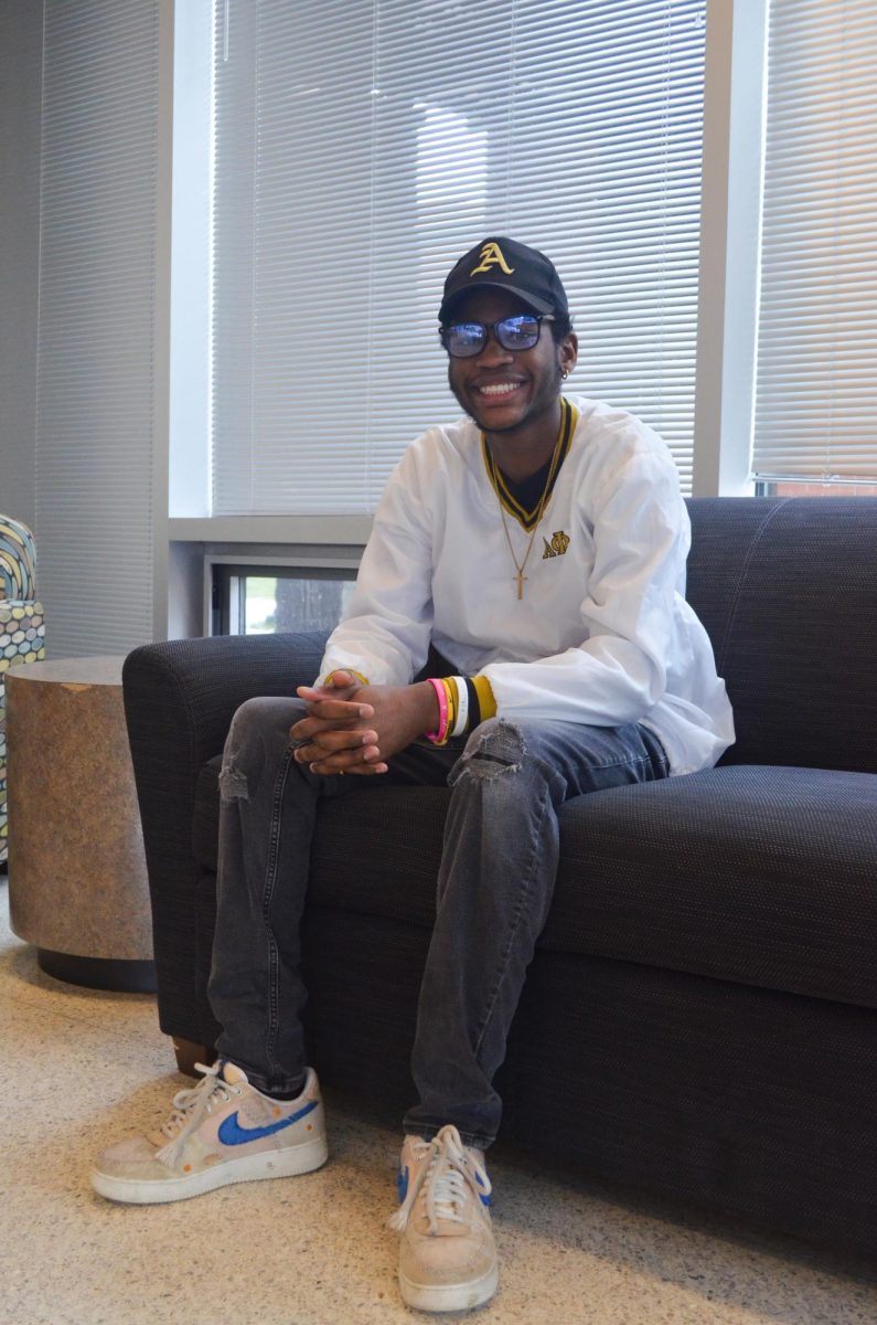 Senior marketing major Jaden Hatcher sits in the Summit Hall lobby on Jan. 19. Hatcher is the sole active member of App State’s Alpha Phi Alpha Fraternity, Incorporated. 