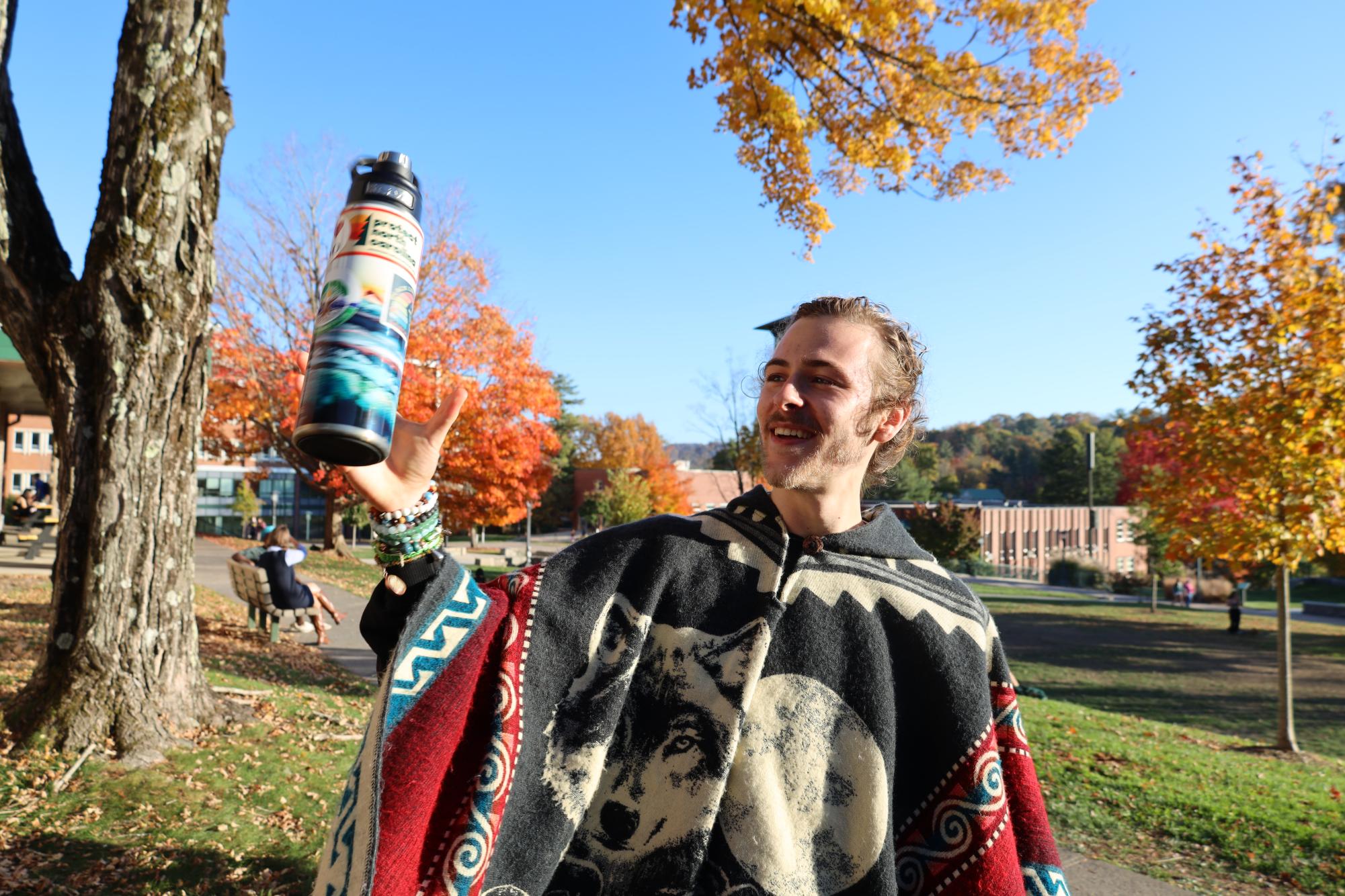 Charlie Frank throws his water bottle into the air on Sanford Mall on Oct. 23. 