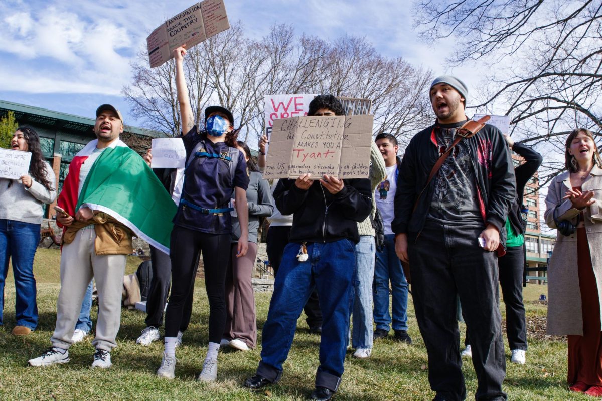 Protesters stand on Sanford Mall to advocate for the rights of immigrants in the U.S. on Feb. 3. 