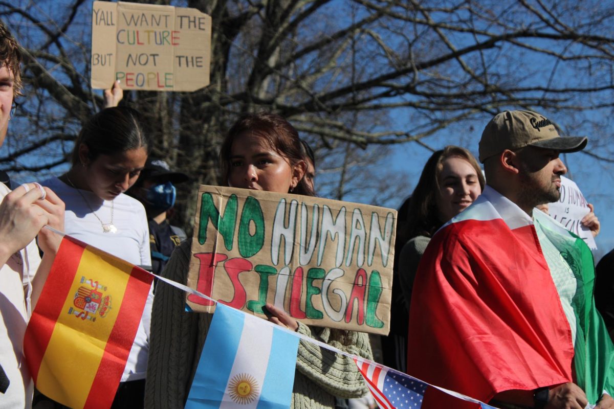 Sophomore political science major Monica Ruiz-Bautista holds a sign while protesting for immigration reform that reads “NO HUMAN IS ILLEGAL” on Feb. 3. 