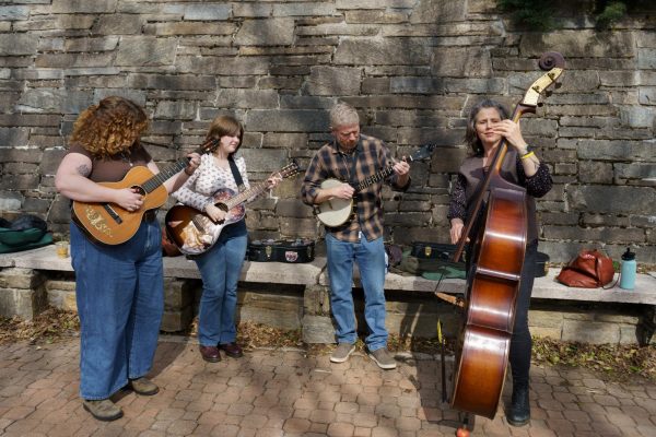 The Howell Family Band practices outside Plemmons Student Union during the Old-Time Fiddler’s Convention on Feb. 8.