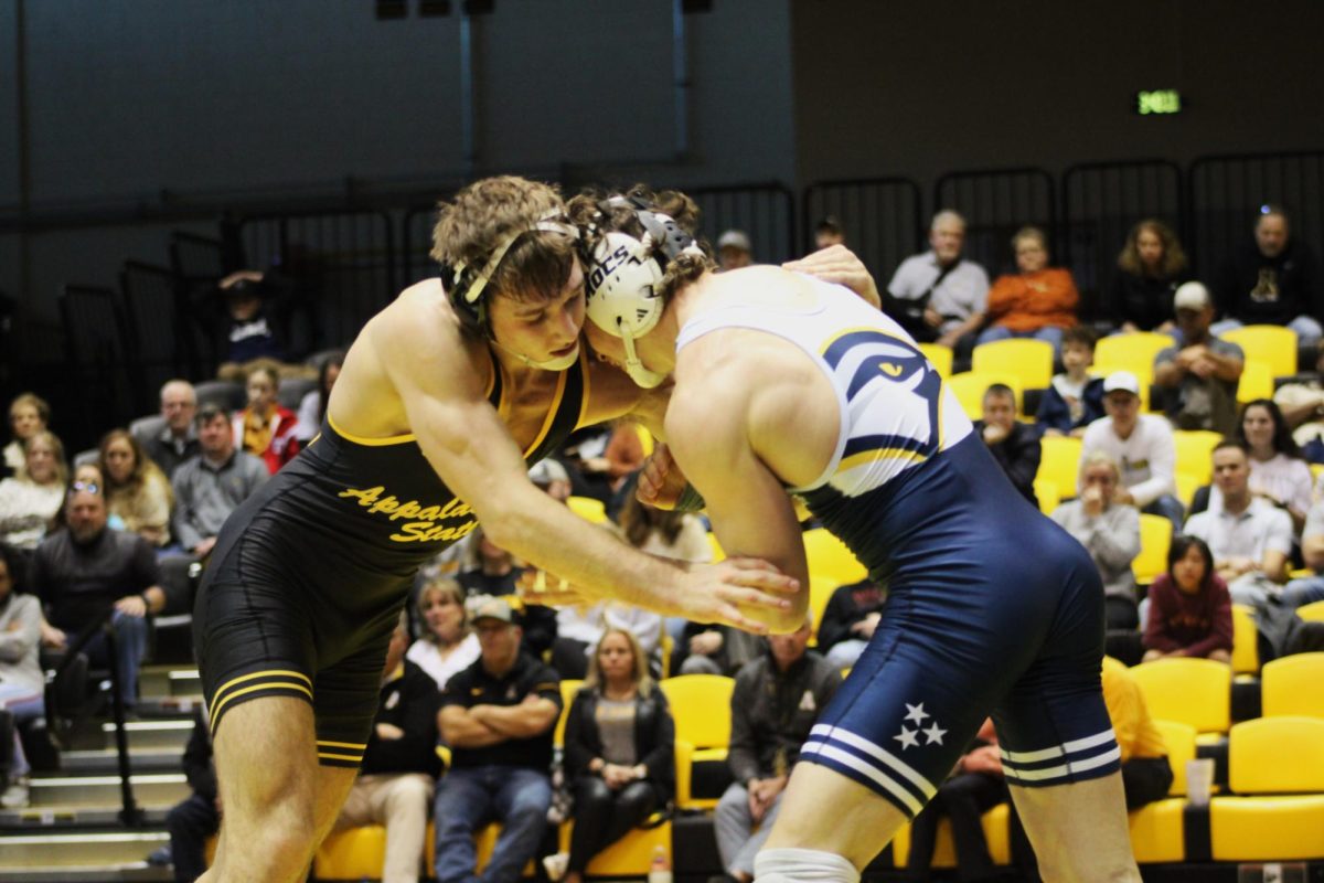 Redshirt sophomore 149-pound Kaden Keiser holds his Chattanooga opponent in a tie-up during their match on Feb. 9. Keiser ended up taking this match 8-6, making his record for the season 16-6.