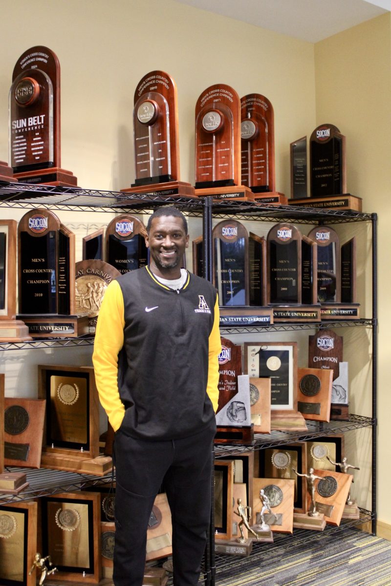 Director of Track & Field and Cross Country Damion McLean in the Mark E. Ricks Athletics Complex on Feb. 18.