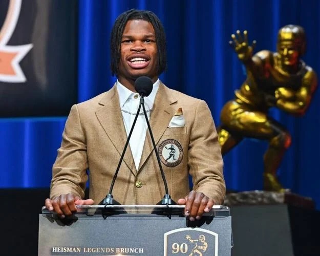 Colorado Buffaloes cornerback Travis Hunter, the 2024 Heisman Trophy recipient, wears a custom blazer designed by Mitch Purgason. Courtesy of Mitch Purgason.