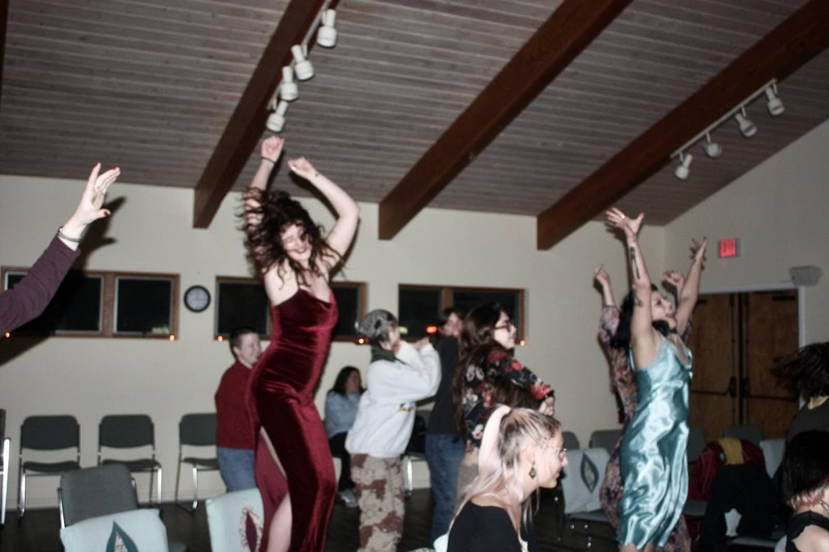 Attendees participate in ecstatic dance during the “Divine Feminine” service on Feb. 6, 2024.  Courtesy of Em Player, photo by Camille Kerner 
