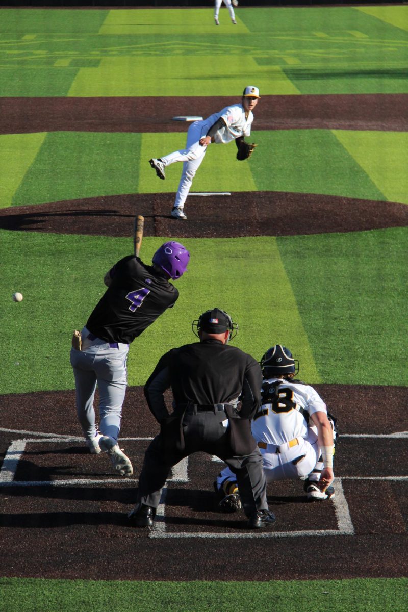 Western Carolina’s senior two-way pitcher-infielder Mason Holton fouls off a pitch from App State’s freshman pitcher Conner Barozzino at Beaver Stadium On April 9. 