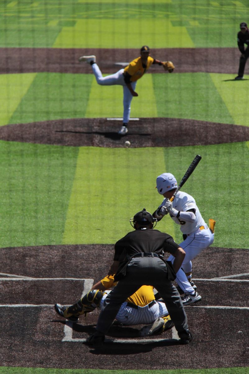 Sophomore outfielder Jake Cook gets a base hit off App State pitcher Collin Welch at Beaver Stadium on April 27.