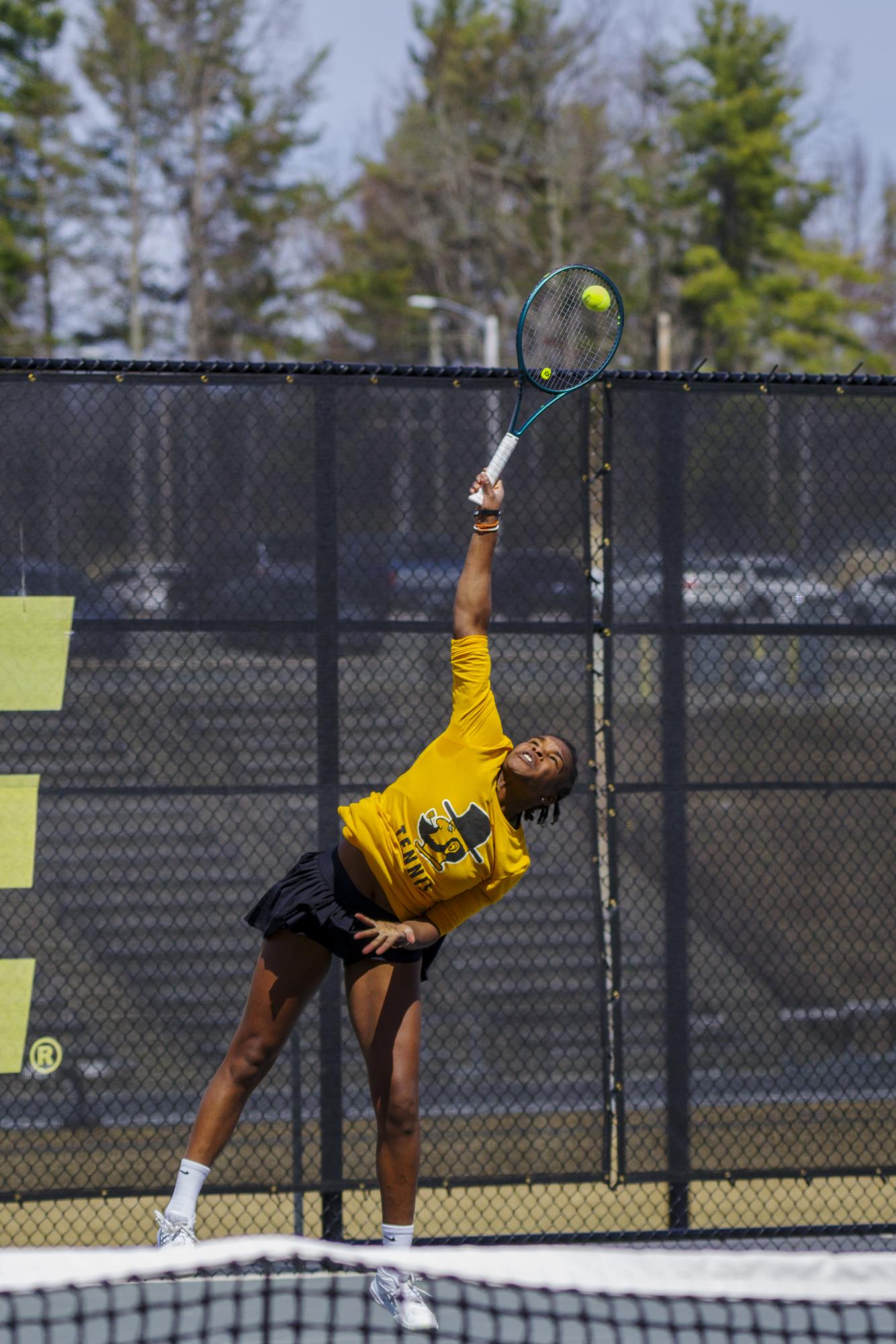 Dada-Mascoll smashes an overhead ball on App State’s home tennis courts at the Appalachian 105 Complex in Boone, NC. Dada-Mascoll ruled the home turf this season with eight solo and six duo wins in Boone. 