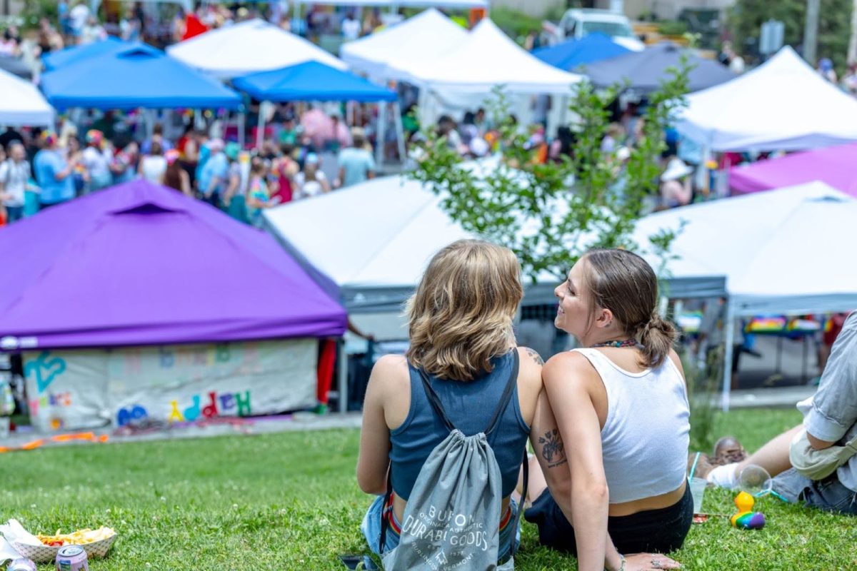 As the Pride festival begins, attendees explore vendor booths on June 28. The booths house local artists as well as local establishments.