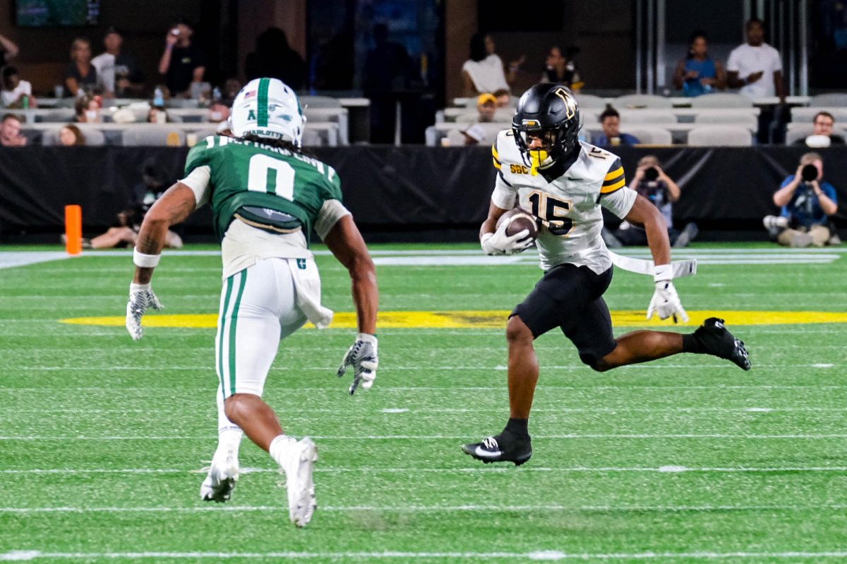 App State junior wide receiver Jaden Barnes stares down Charlotte defensive back Randy Franklin, Charlotte, Aug. 29. Barnes, a transfer from Austin Peay, had over 1000 receiving yards in his final season at Austin Peay and was ranked 11th in the country amongst all Football Championship Subdivision players. 
