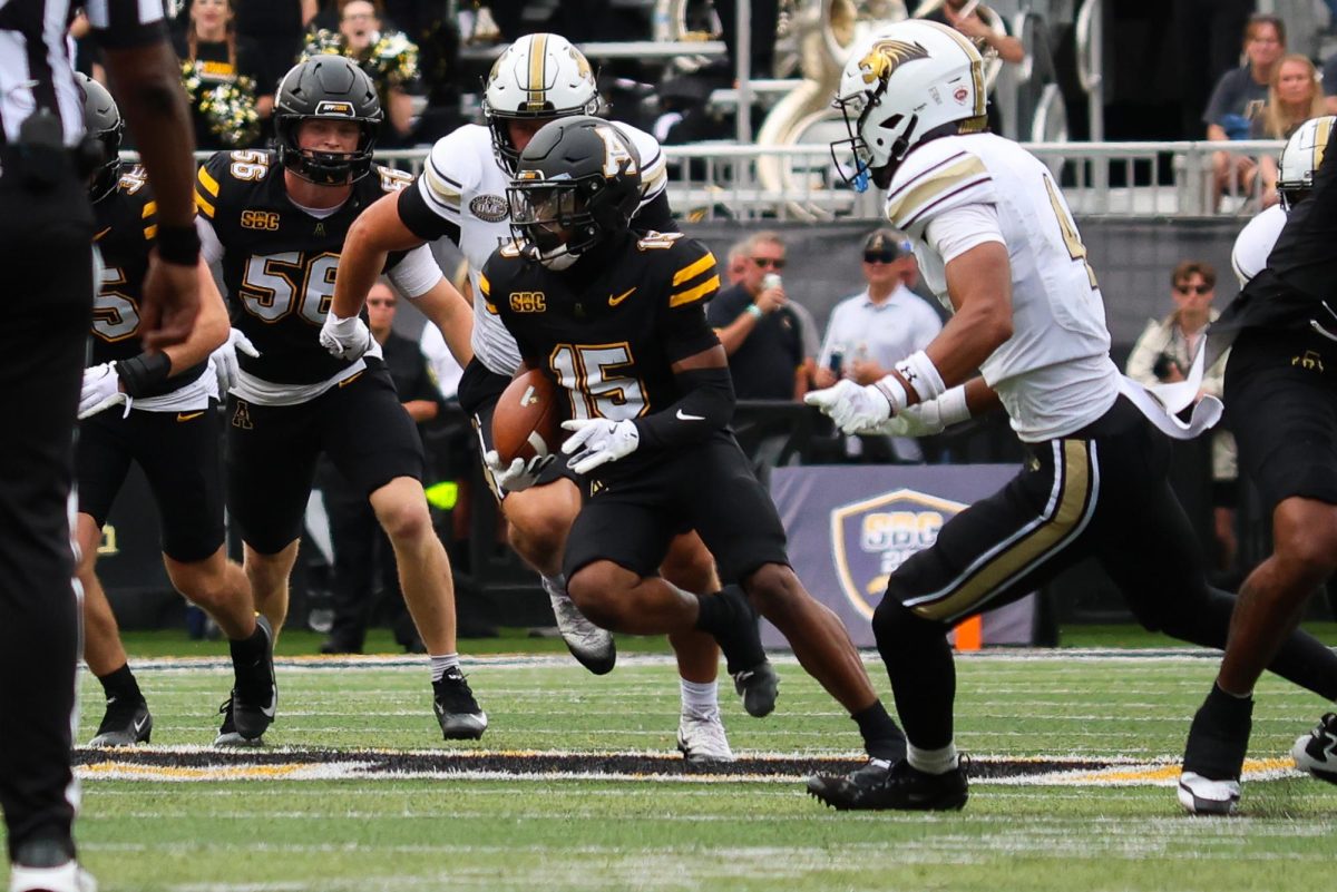 Junior wide receiver Jaden Barnes runs the ball against Lindenwood on Sept. 6.
