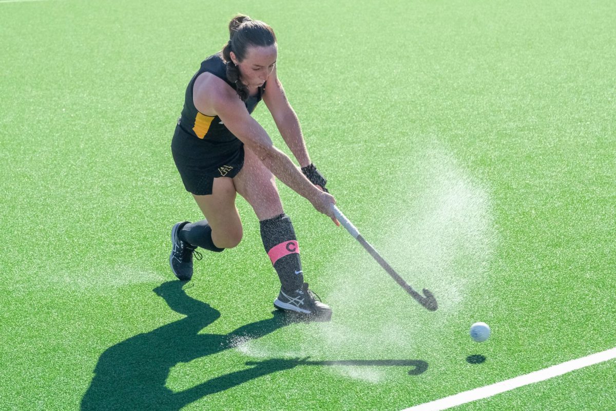 App State senior forward and midfielder Bridget Donovan sweeps the ball to a teammate at Dr. Jan C. Watson Field on Oct. 3.