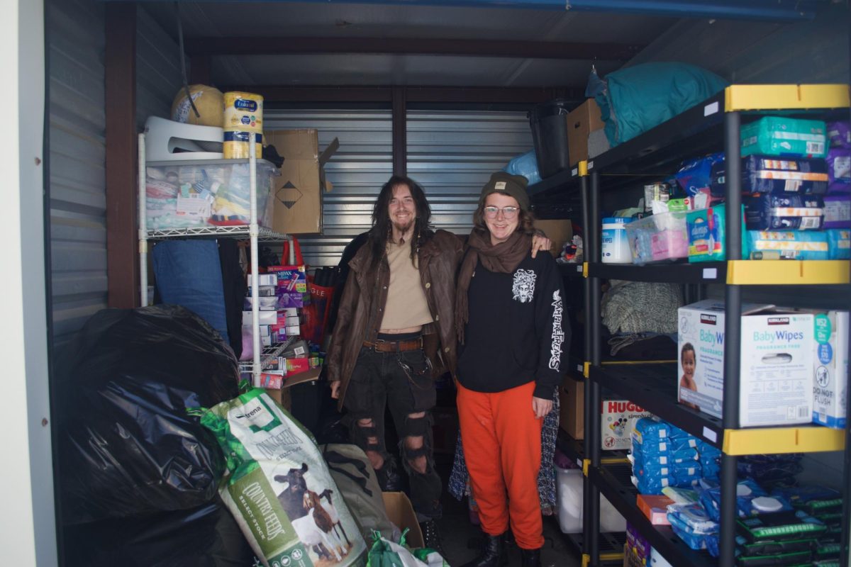  Red Eloranta (left) and Ella Chamberlain (right) inside the free store, Boone, on Oct. 22. 