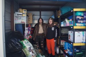  Red Eloranta (left) and Eli Chamberlain (right) inside the free store, Boone, on Oct. 22. 