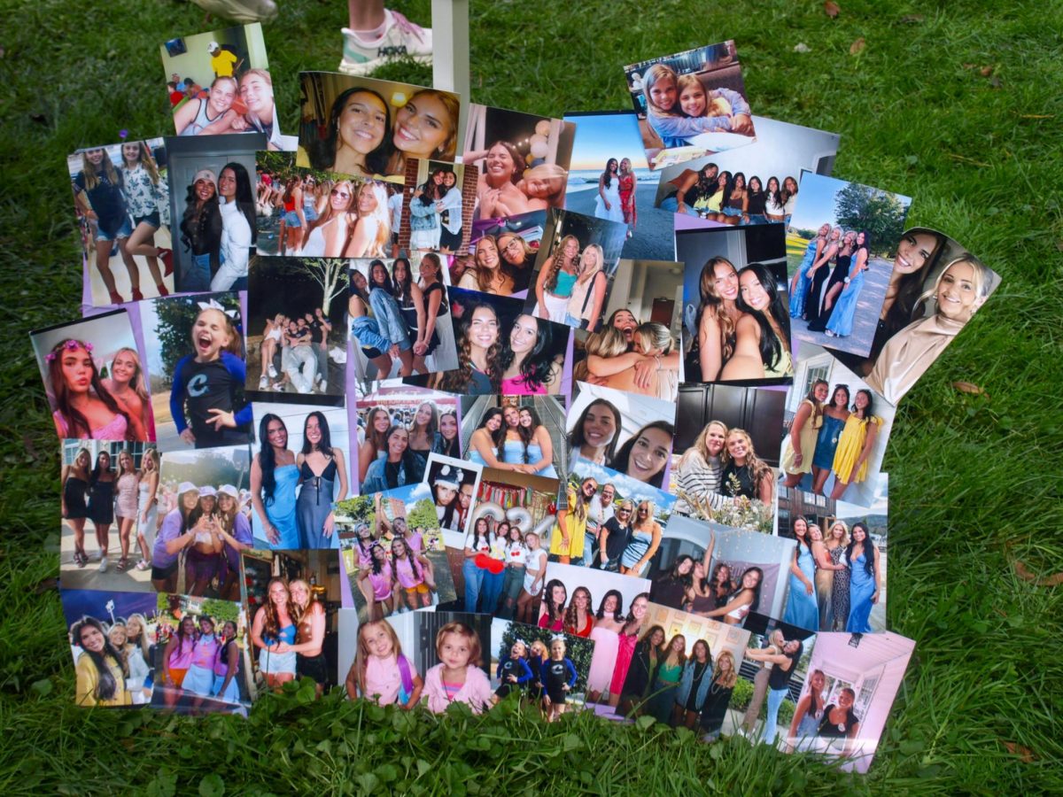 A picture board of Mallory Mayor and her friends displayed at the Miles for Mallory 5k on the Boone Greenway on Sept. 28.
