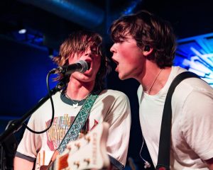 Singers and guitarists Axel Ellis and Will Lipton share the microphone at Boone Saloon on Oct. 9.