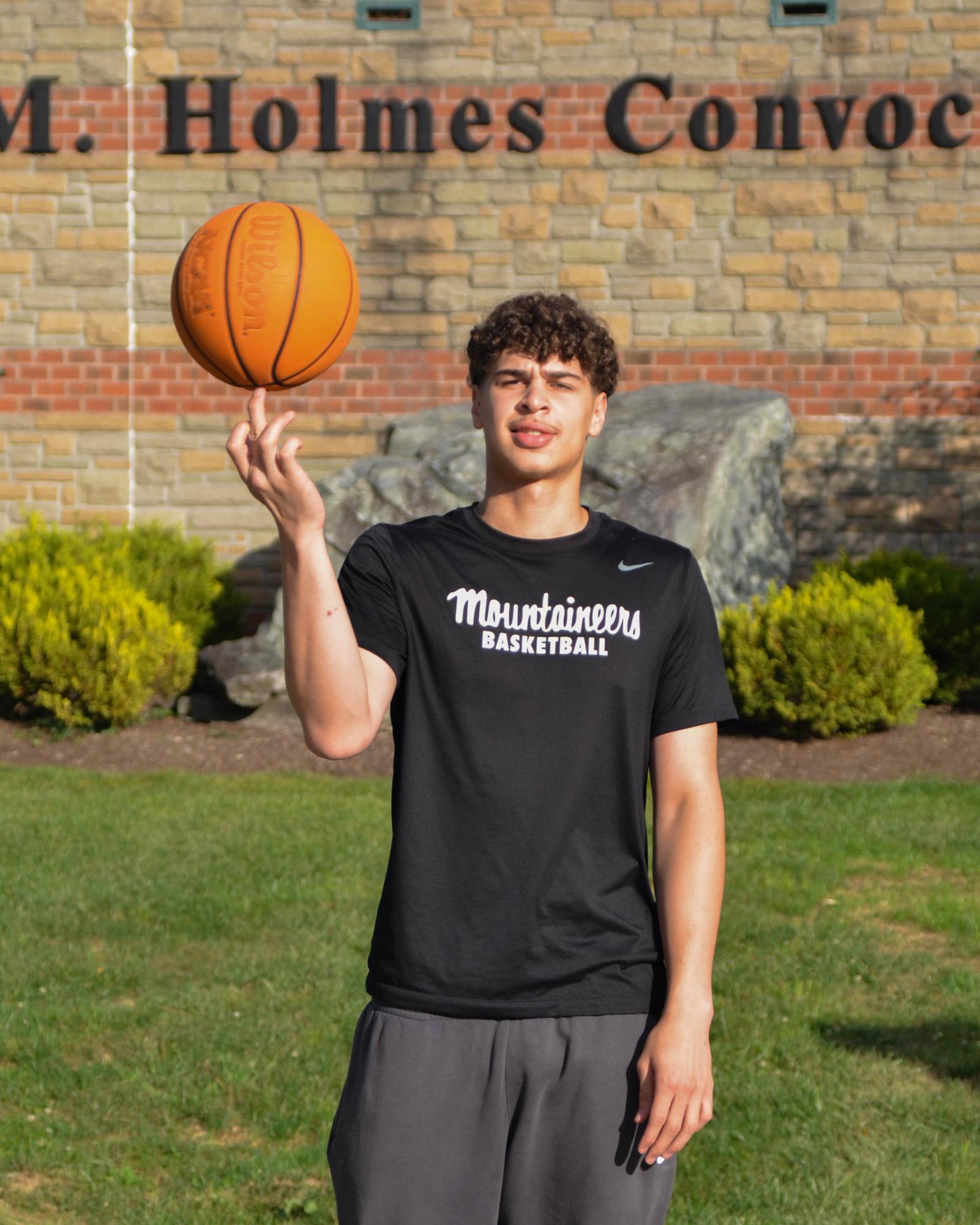 Freshman forward Andrin Njock doing a finger spin in front of Holmes Convocation Center on Sept. 18.