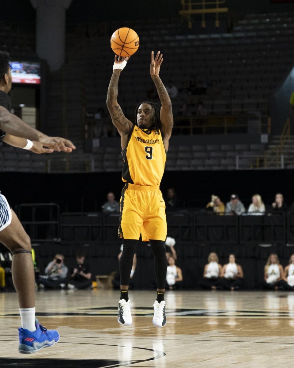  Graduate student guard Jalen Tot shoots from the 3-point line at Holmes Convocation Center on Nov. 5. 