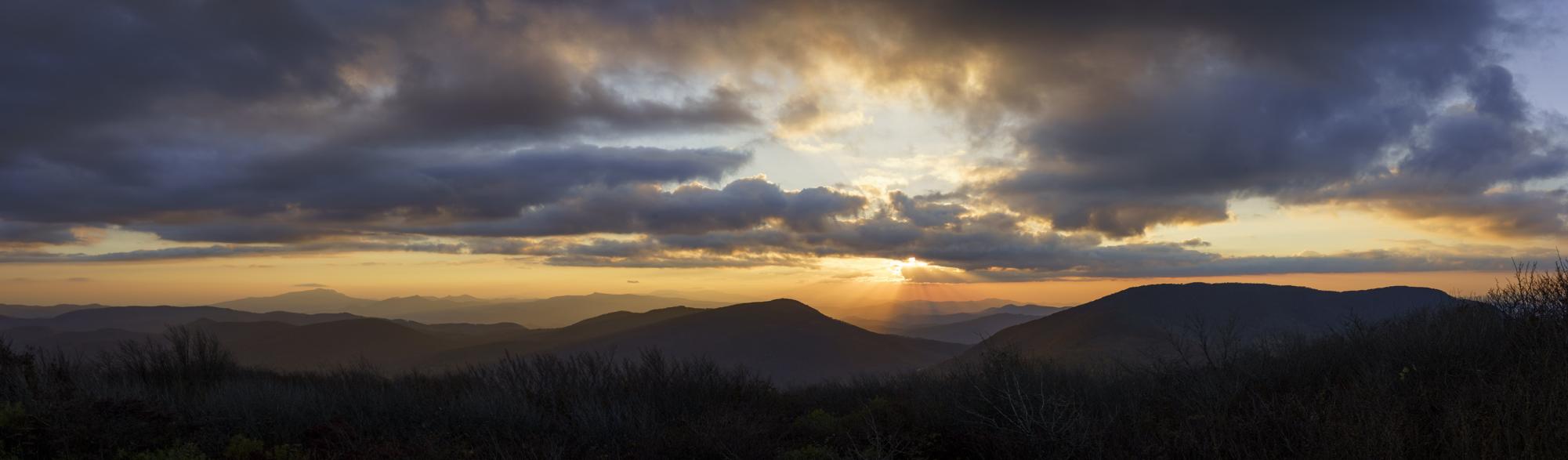Sunset rays shine on the Blue Ridge Mountains at Elk Knob State Park on Oct. 18.
