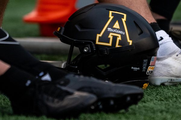 An App State football helmet sits by the bench at Bridgeforth Stadium on Nov. 15. 