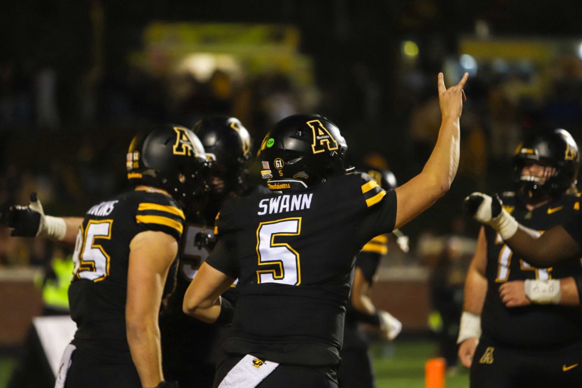 Redshirt junior quarterback AJ Swann celebrates a touchdown in the 3rd quarter against Georgia Southern at Kidd Brewer Stadium on Nov. 6th.
