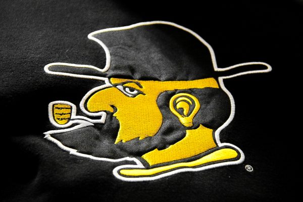 An embroidered Yosef logo on a Mountaineer wrestler's jacket in Varsity Gym on Jan. 27. 