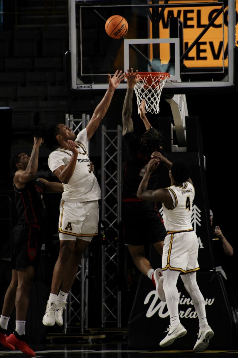 Redshirt sophomore center Luke Wilson and junior guard Eren Banks defending against Louisiana during their match-up in Holmes Convocation Center on Jan. 22. Wilson retrieved 9 rebounds, and Banks added an additional 7 over the duration of this game.