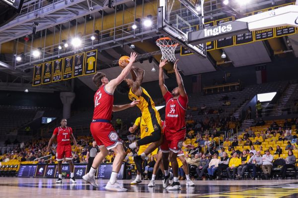 Graduate Student Kasen Jennings reaches for a layup against South Alabama on Feb. 4 at the Holmes Convocation Center.