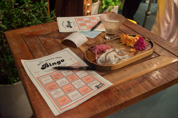Guests at Betty’s Biscuits enjoy their plate of goodies while playing a game of bingo.