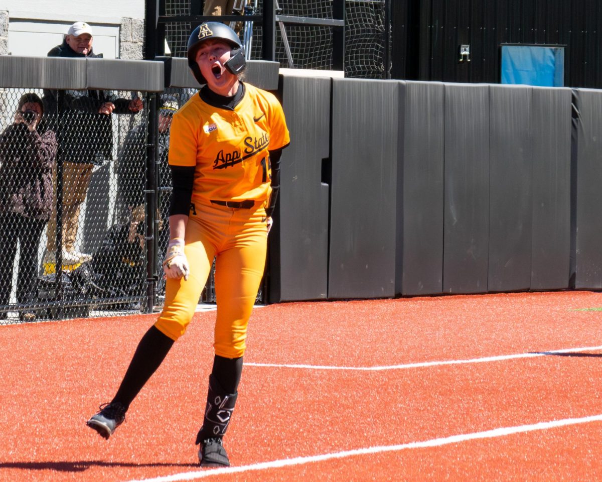 Senior infielder Makayla McClain runs to home plate after hitting a home run to set App State's single-season home run record at Sywassink/Lloyd Family Stadium on March 29.