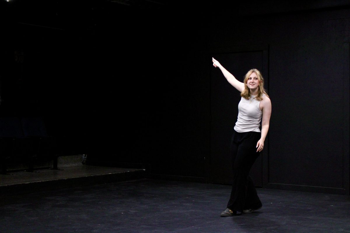 Senior finance and banking major, Athena Ackerman, singing Dr. Facilier’s “Friends on the Other Side” from the Princess and the Frog at the Miscast Cabaret event on March 21.