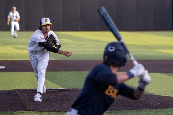  Senior right-handed pitcher Everette Harris pitches against ETSU in Jim and Bettie Smith Stadium on April 21. Harris allowed zero earned runs in two innings against the Buccaneers. 
