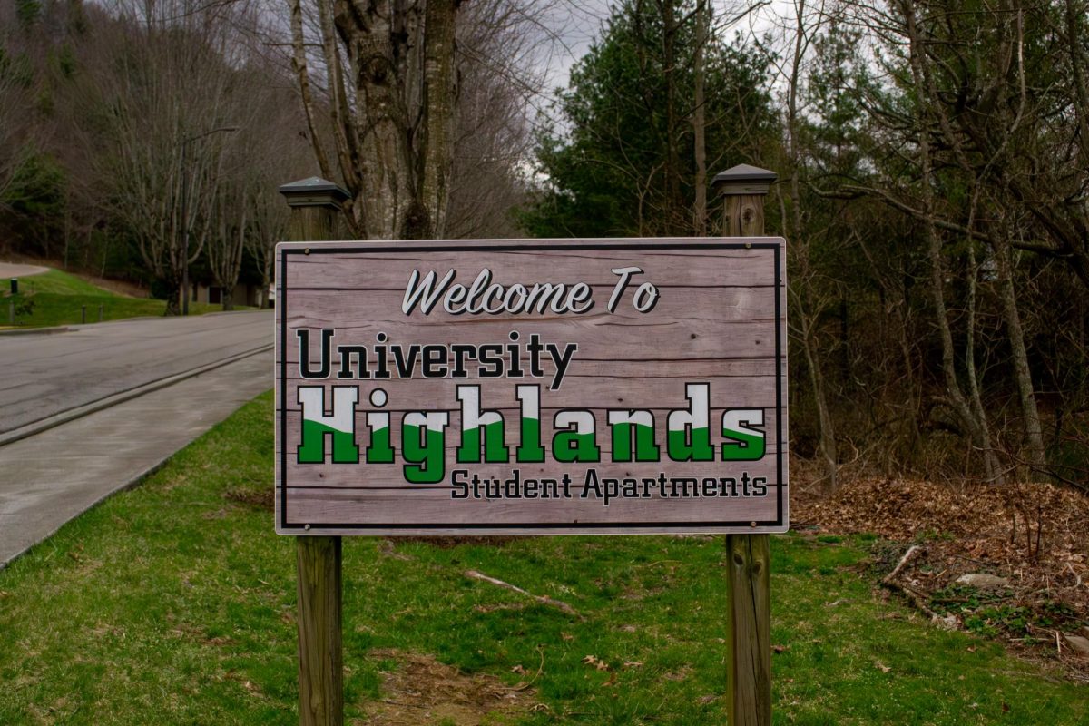 A welcoming sign greets residents and visitors at one of the entrances to University Highlands on March 15. A fitness center, clubhouse, swimming pool and basketball court are just a few of the amenities offered at University Highlands