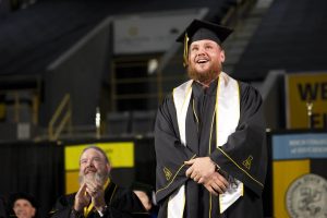 Country music star Luke Combs smiles at Appalachian State University's Spring 2026 Commencement ceremonies in Boone, North Carolina, where Combs received an honorary degree of music. (Kyla Willoughby)